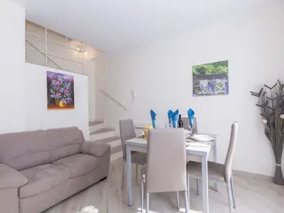 Zugang vom ersten Stock zum Wohnzimmer