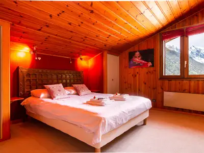 Schlafzimmer 1 mit einem Doppelbett