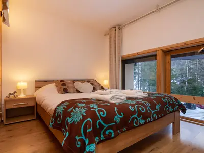 Schlafzimmer 1 mit einem Doppelbett