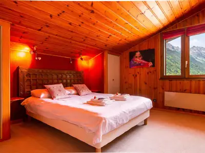 Schlafzimmer 1 mit einem Doppelbett