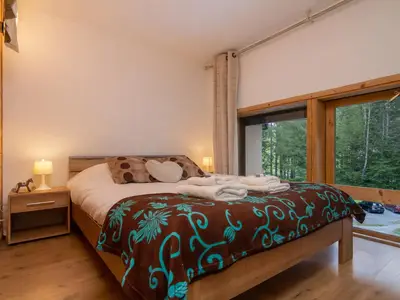 Schlafzimmer 1 mit einem Doppelbett