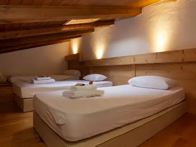 Zwischengeschoss Schlafzimmer mit 2 Einzelbetten