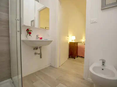 Badezimmer führt in das Schlafzimmer