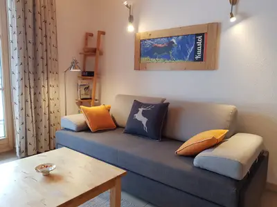 Wohnzimmer Apartment "Kuastoi" / apartments gosaukamm.com