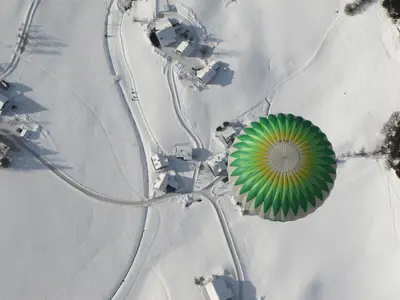 Ballonfahrt über unser Haus / Apartments gosaukamm.com