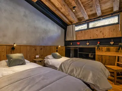 Zweites Schlafzimmer mit getrennten Betten
