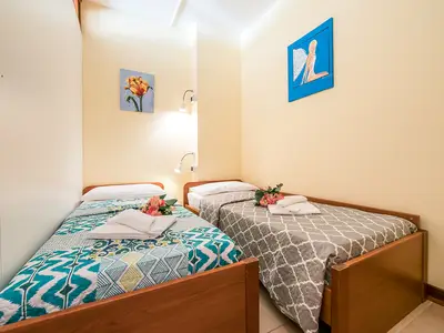 Zweites Schlafzimmer mit 2 Einzelbetten