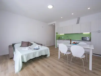 Das gemütliche Wohnzimmer mit Schlafsofa