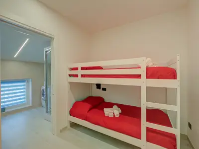 Zweites Zimmer mit Etagenbetten