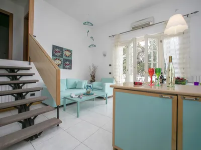 Das Wohnzimmer mit Sofabett