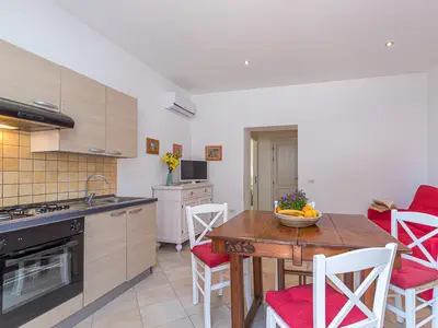 Wohnzimmer mit Küche