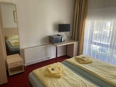 Dreibettzimmer