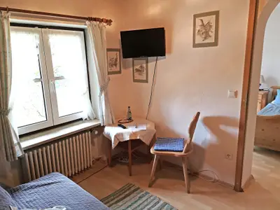 Doppelzimmer mit Sitzgruppe