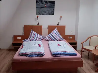 Doppelbett & Sitzbereich