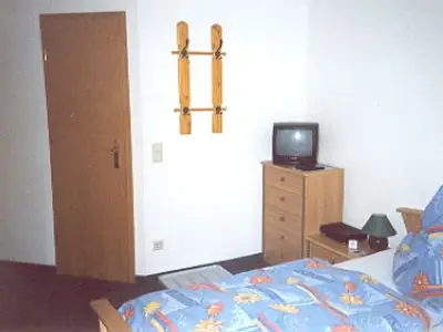 double bedroom with extra bed