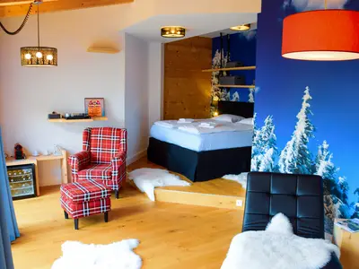 Deluxe Zimmer mit Kingsize-Bett und Balkon