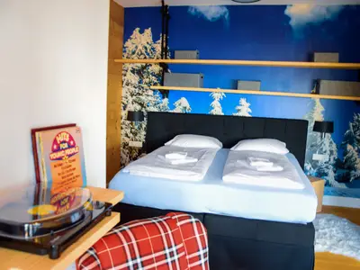 Deluxe Zimmer mit Kingsize-Bett und Balkon