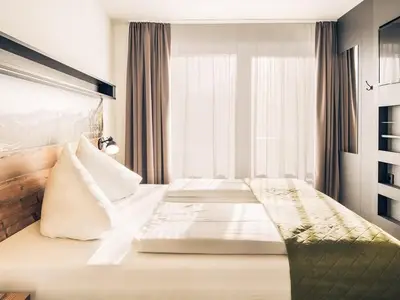 Doppelzimmer für 3 Personen (28 m²) in Jenig 8/10