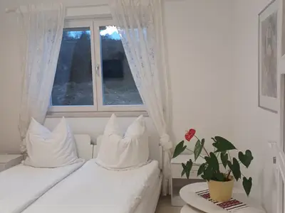 Schlafzimmer 2 mit zwei getrennten Betten