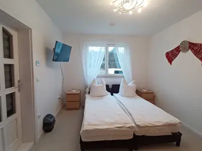 Schlafzimmer 3 mit zwei getrennten Betten