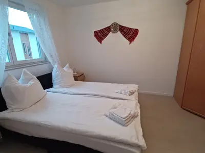 Schlafzimmer 3 mit zwei getrennten Betten