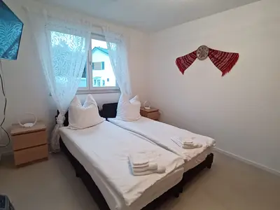 Schlafzimmer 3 mit zwei getrennten Betten