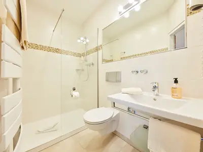 Badezimmer im Deluxe Doppelzimmer