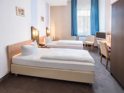 Doppelzimmer mit getrennten Betten