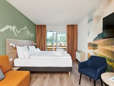 Doppelzimmer Bergblick mit Balkon