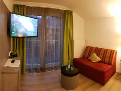 Sitzbereich / Couch mit TV