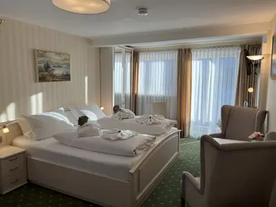 Doppelzimmer Ostseite  - Balkon - Wohnbeispiel