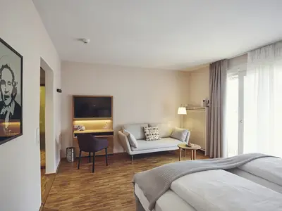 Dichter&Denker Platanen mit franz. Balkon