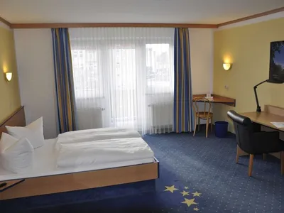 Doppelzimmer für 3 Personen (27 m²) in Neustadt 3/3
