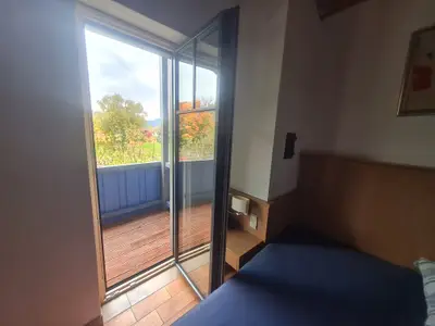 Zimmer Wolken 2 OG Sicht auf Balkon