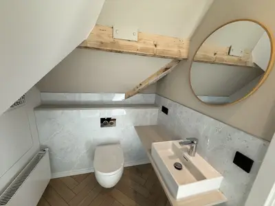 Dachgeschosszimmer mit Seeblick