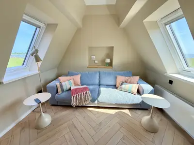 Dachgeschosszimmer mit Seeblick