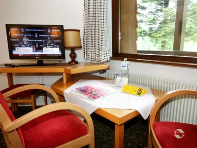 Sitzgelegenheit im Doppelzimmer