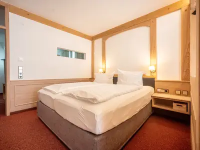 Komfort Doppelzimmer mit Boxspringbetten von Schramm Beds