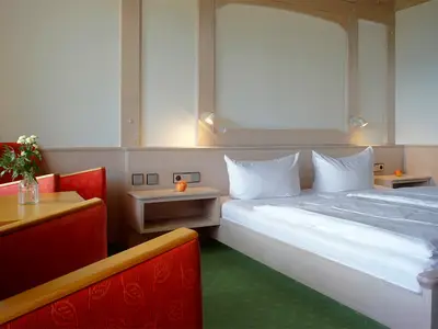 Standard Doppelzimmer Sonnenalm Bett