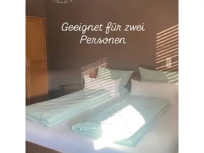 Bett im Ferienzimmer Hofblick