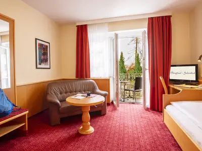 Einzelzimmer mit Sofa