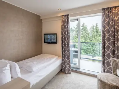 Zimmerbeispiel Einzelzimmer mit Balkon "For One+"