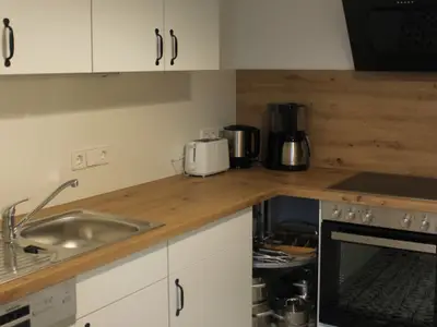 Küche,Ferienzimmer Gartenblick,