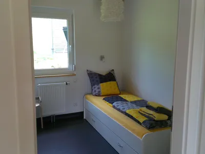 Kinderzimmer mit Einzelbett