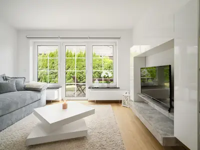 Ferienhaus Landhus Alt Schwerin Wohnzimmer mit Terrassenzugang