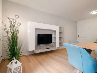 Ferienhaus Landhus Alt Schwerin Wohnzimmer mit TV-Wand