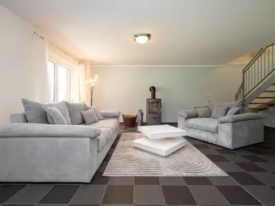 Einfamilienhaus Träumerei Alt Schwerin Wohnzimmer mit großzügiger Couch