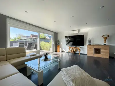 Cuxland-Fewo-Service - Ferienhaus Lindenweg - Wohnzimmer