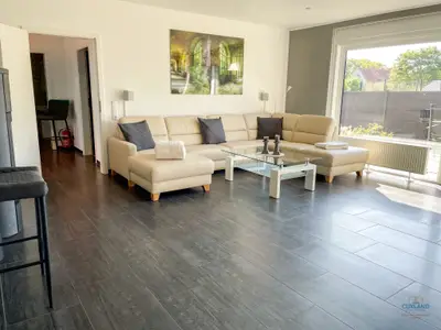 Cuxland-Fewo-Service - Ferienhaus Lindenweg - Wohnzimmer
