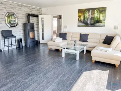 Cuxland-Fewo-Service - Ferienhaus Lindenweg - Wohnzimmer